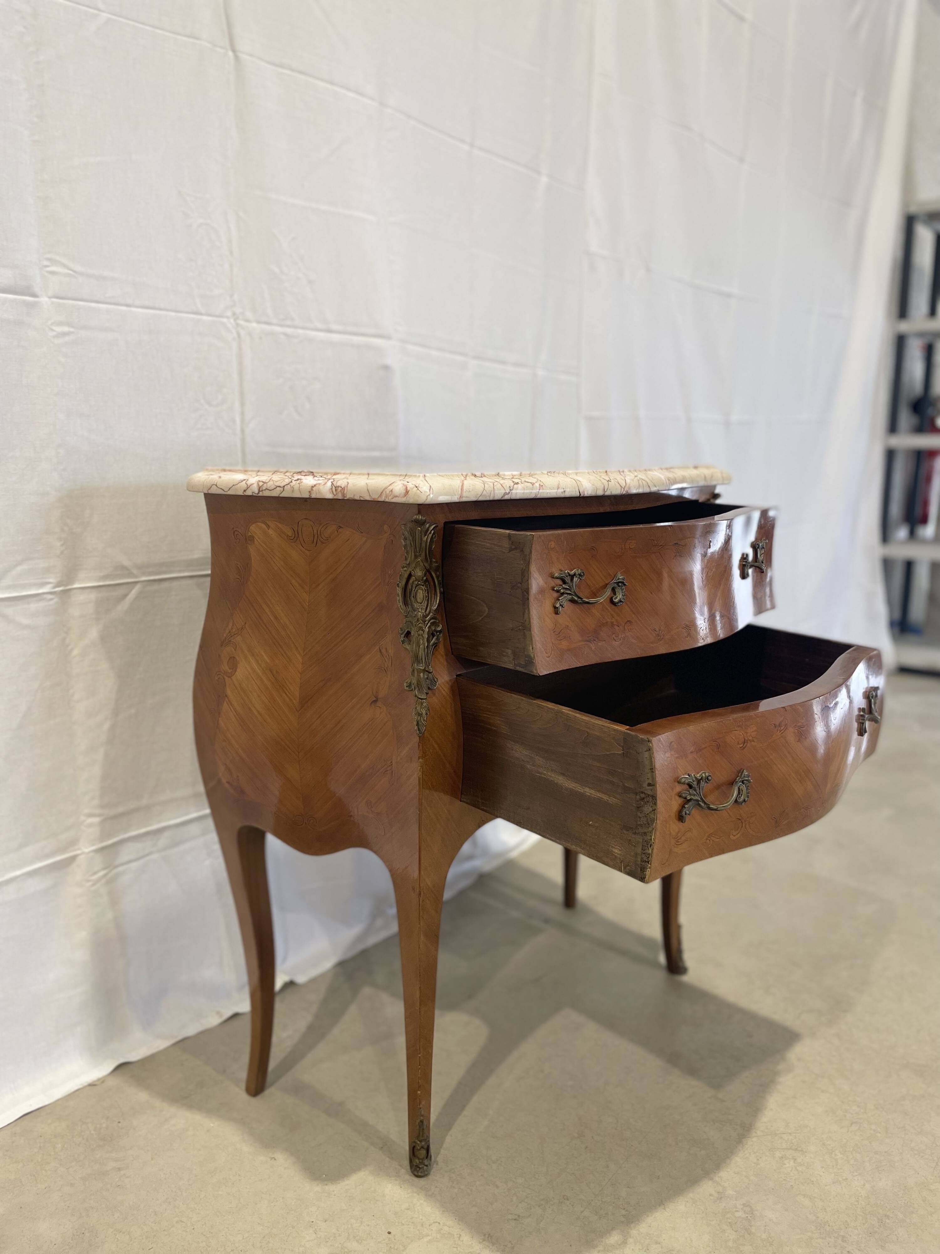Old curved chest of drawers inlaid and marble Louis XV style