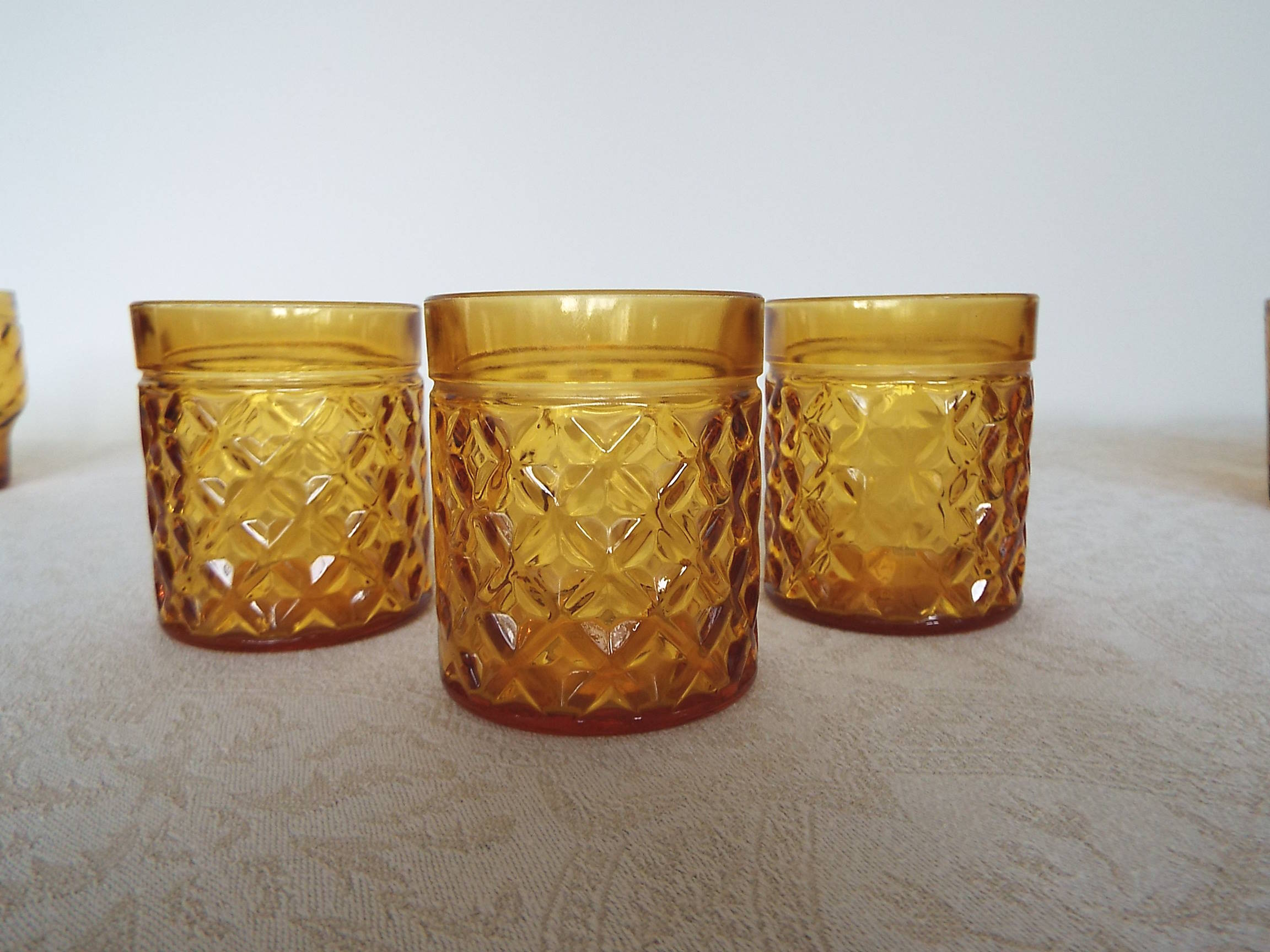 8 amber glasses