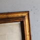 Miroir ancien en bois doré 42x52cm