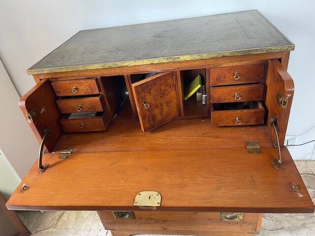 boat chest of drawers, leather, brass, exotic wood, purchased in 1970.