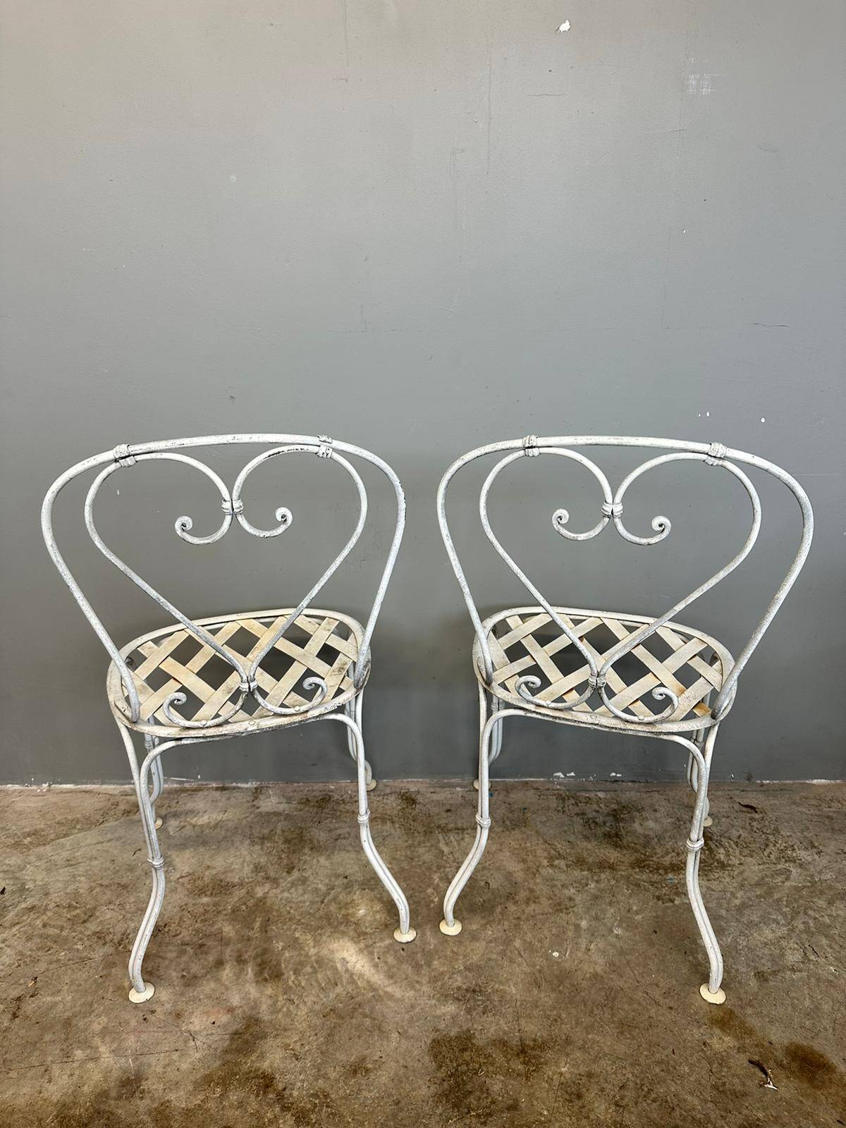 Pair of wrought iron chairs