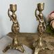 Paire de bougeoirs en bronze, porteuses d’eau