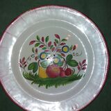 Round dish in earthenware from the east