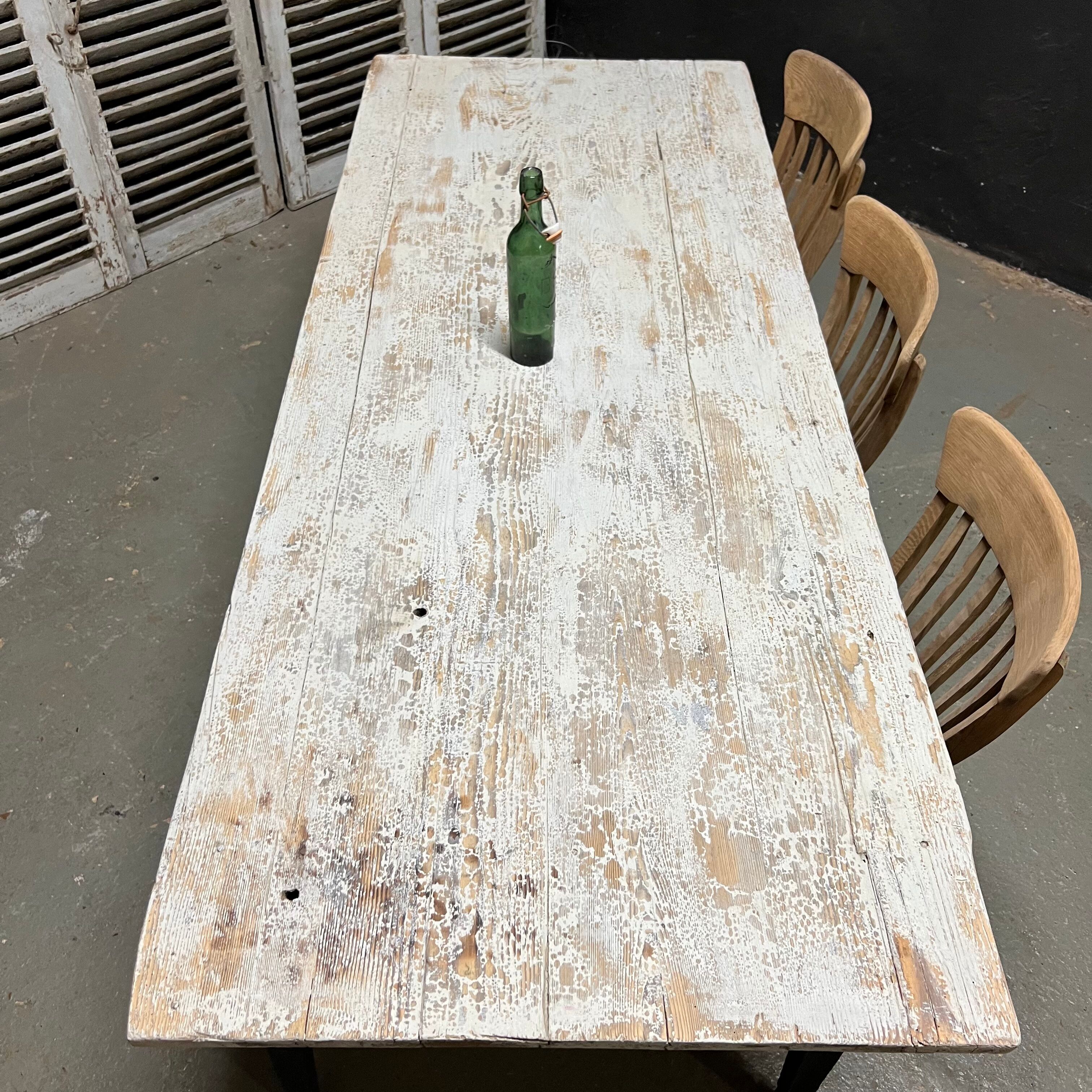 Black farmhouse table and white patinated top