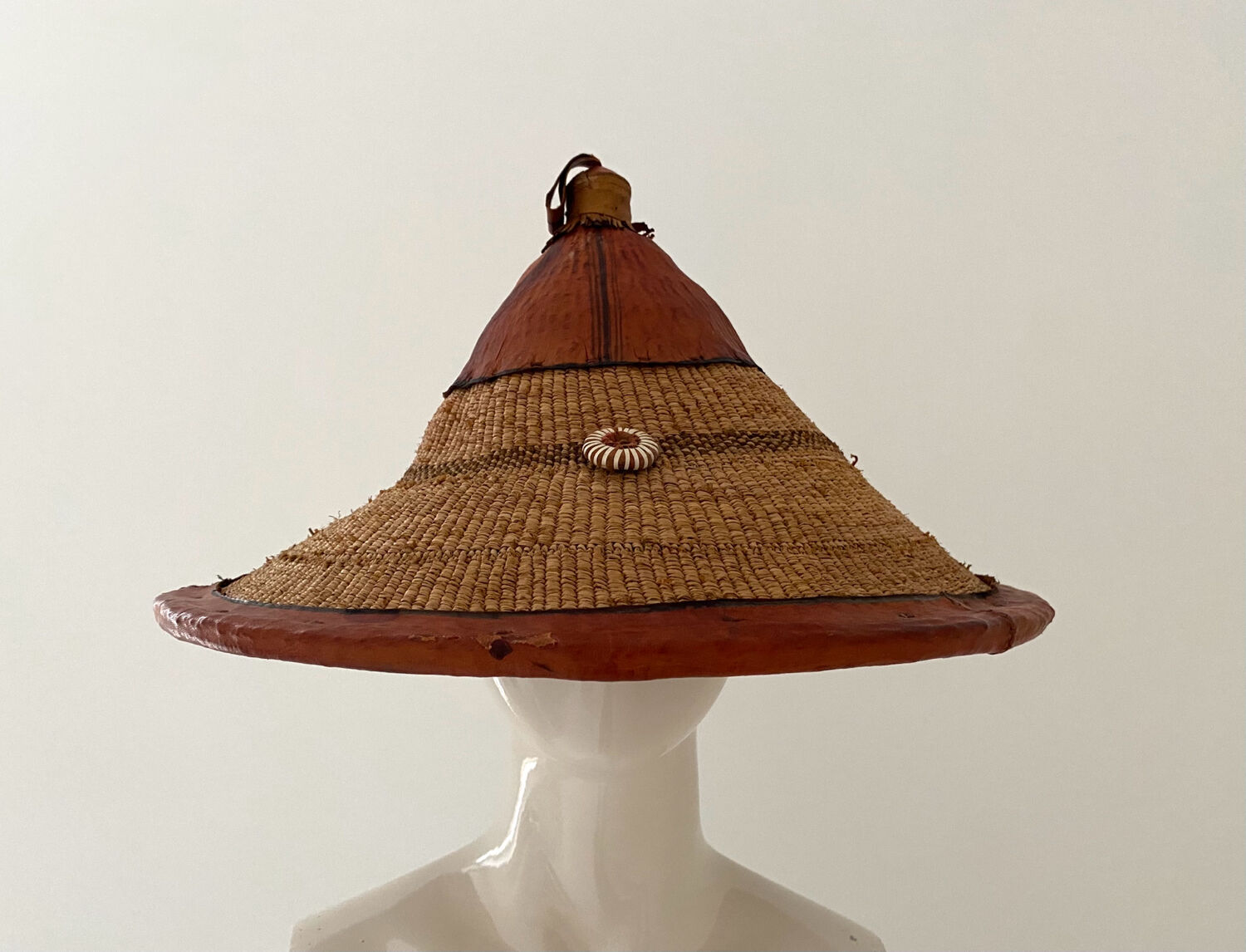 Traditional African Fulani hat in leather and woven straw