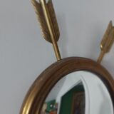 Curved brass witch's mirror