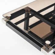 Coffee table attributed to Romeo Rega. Iron and smoked glass – France, 1980s.