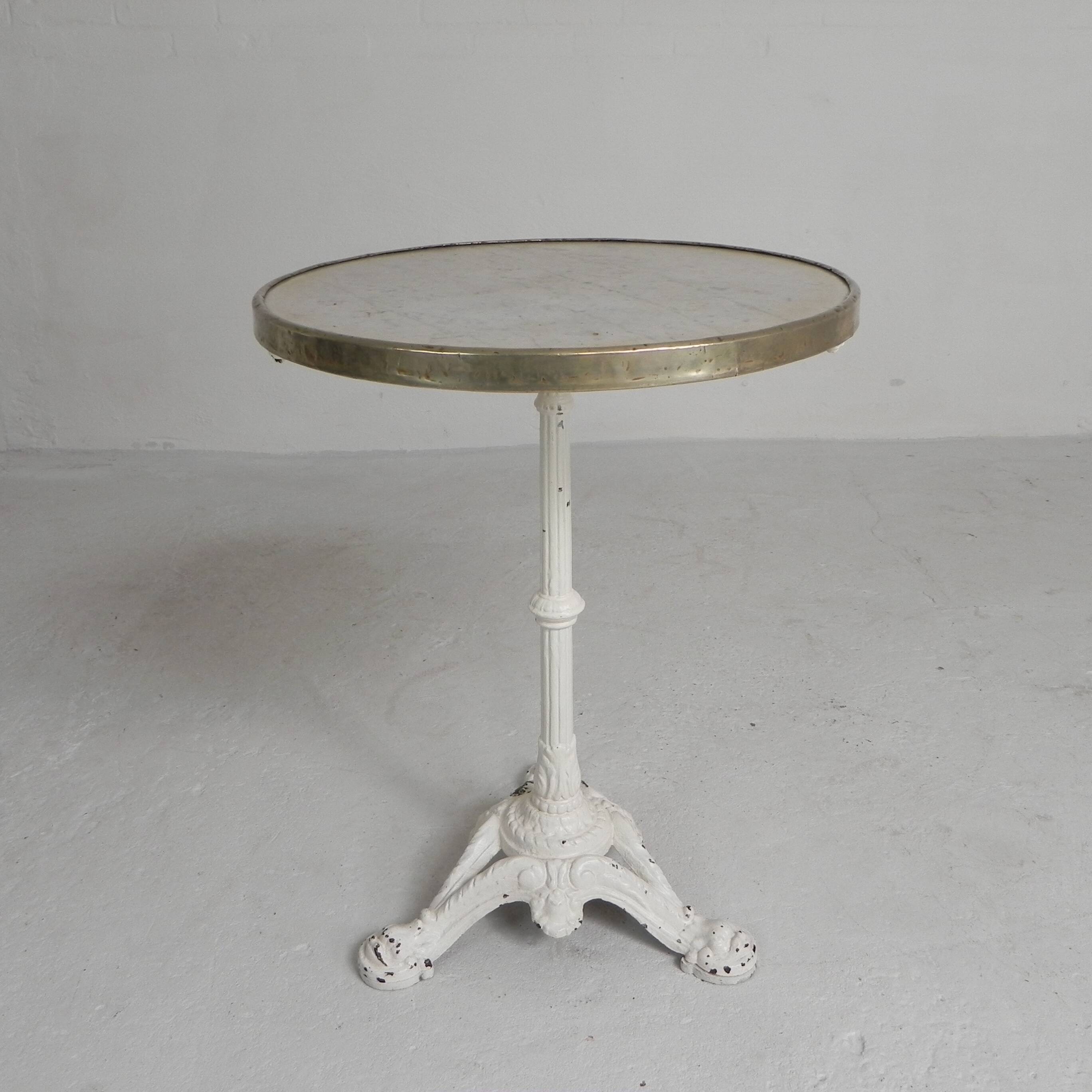 Bistro table with cast iron legs and marble top, 1920s.