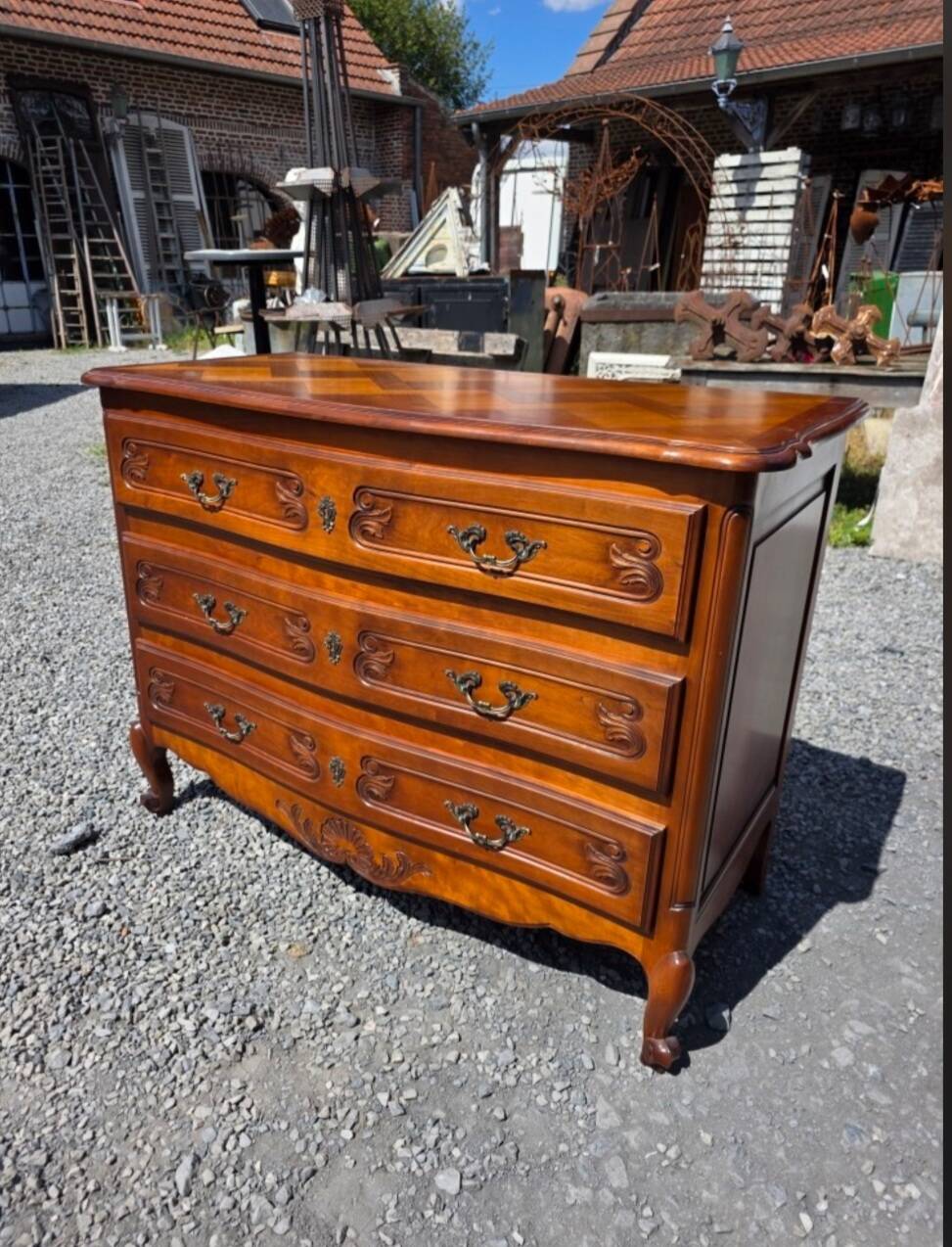 Curved commode in Louis XV style made of cherry wood.