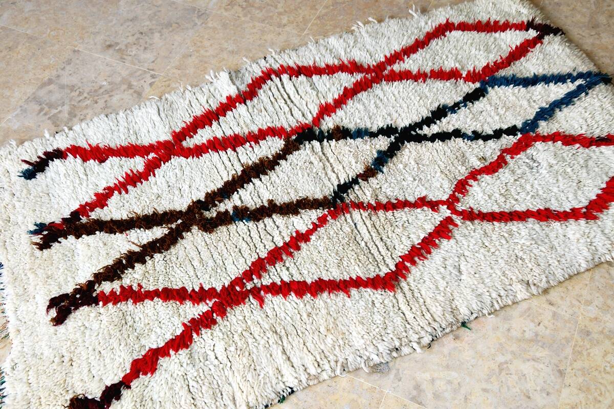 Small vintage beni ouarain rug