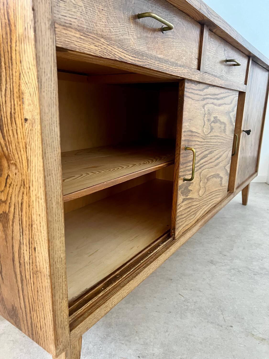 Old oak sideboard from the 1950s, vintage reconstruction period