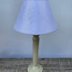Beige ceramic lamp and iridescent white lampshade