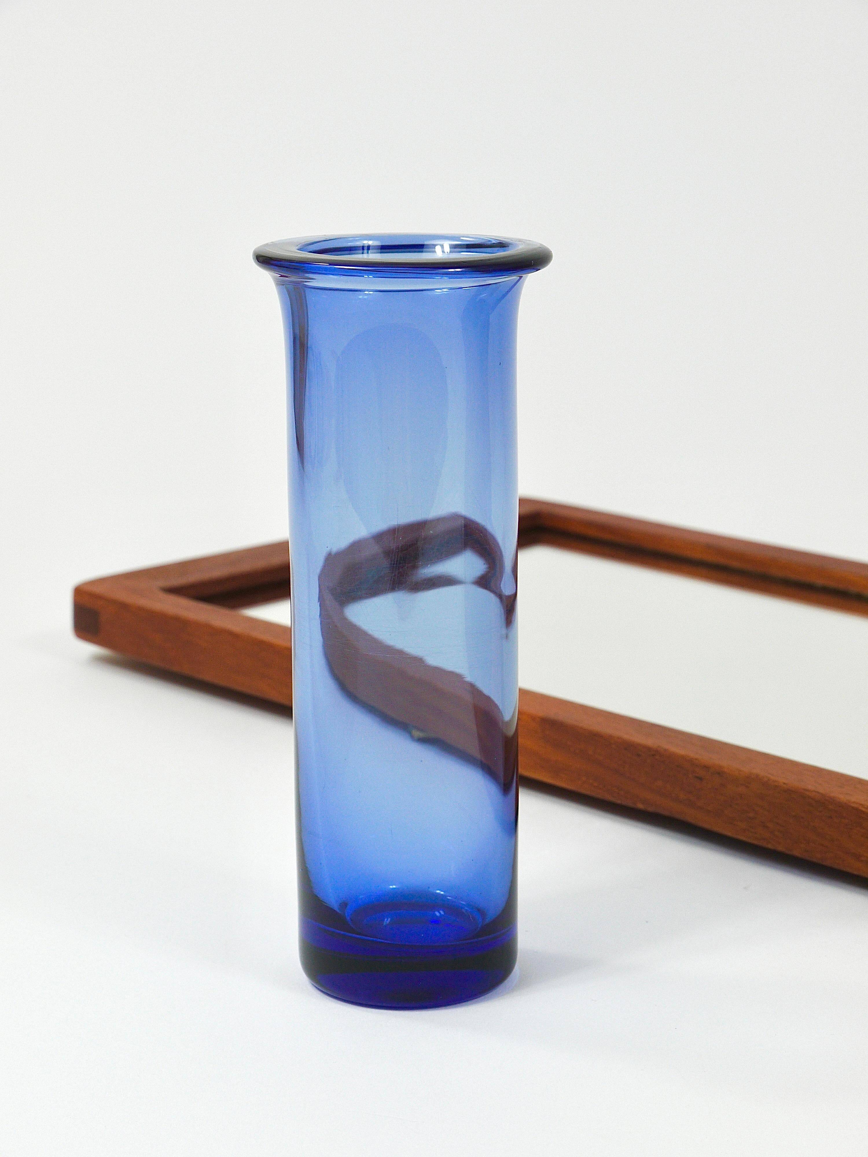 Danish wall mirror by Jacob Hermann & Per Lütken and Holmegaard glass vase, 1960s.