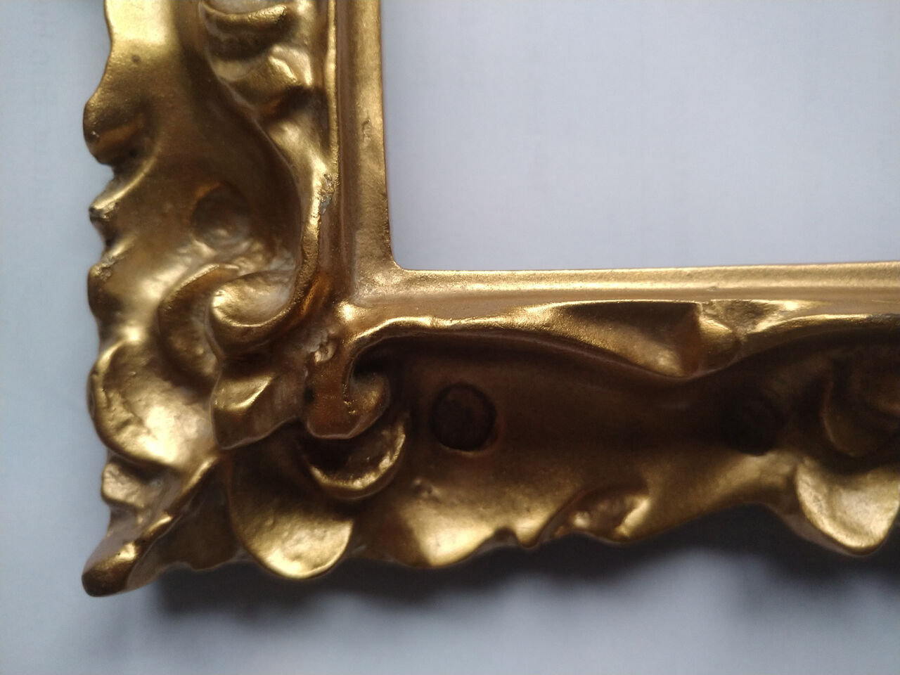 Sculpted square golden frame