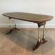 Neoclassical coffee table in wood, brass and leather