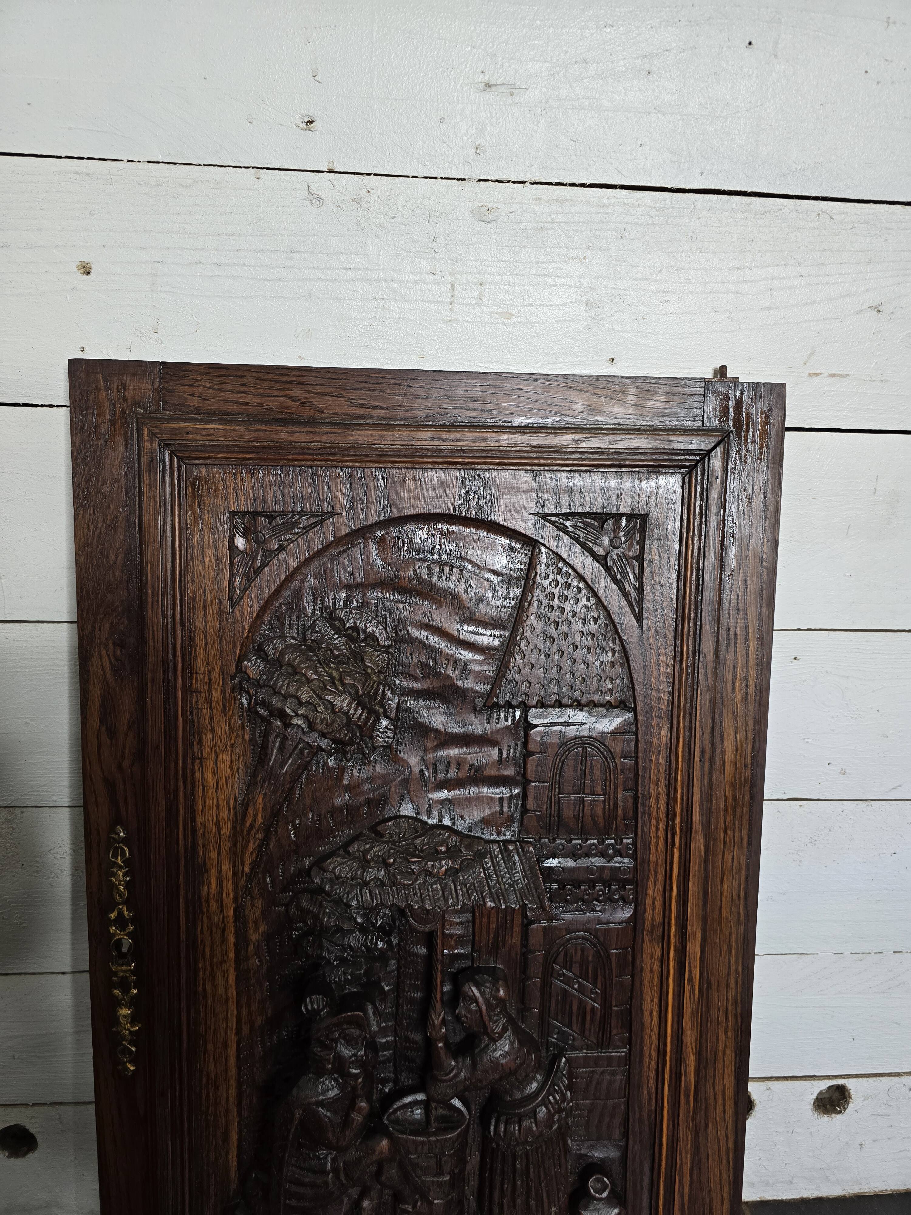 Old wooden door carved from oak