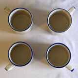 Set of 4 stoneware cups/mugs with blue floral designs, made in China.
