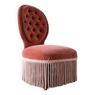 Pink velvet armchair