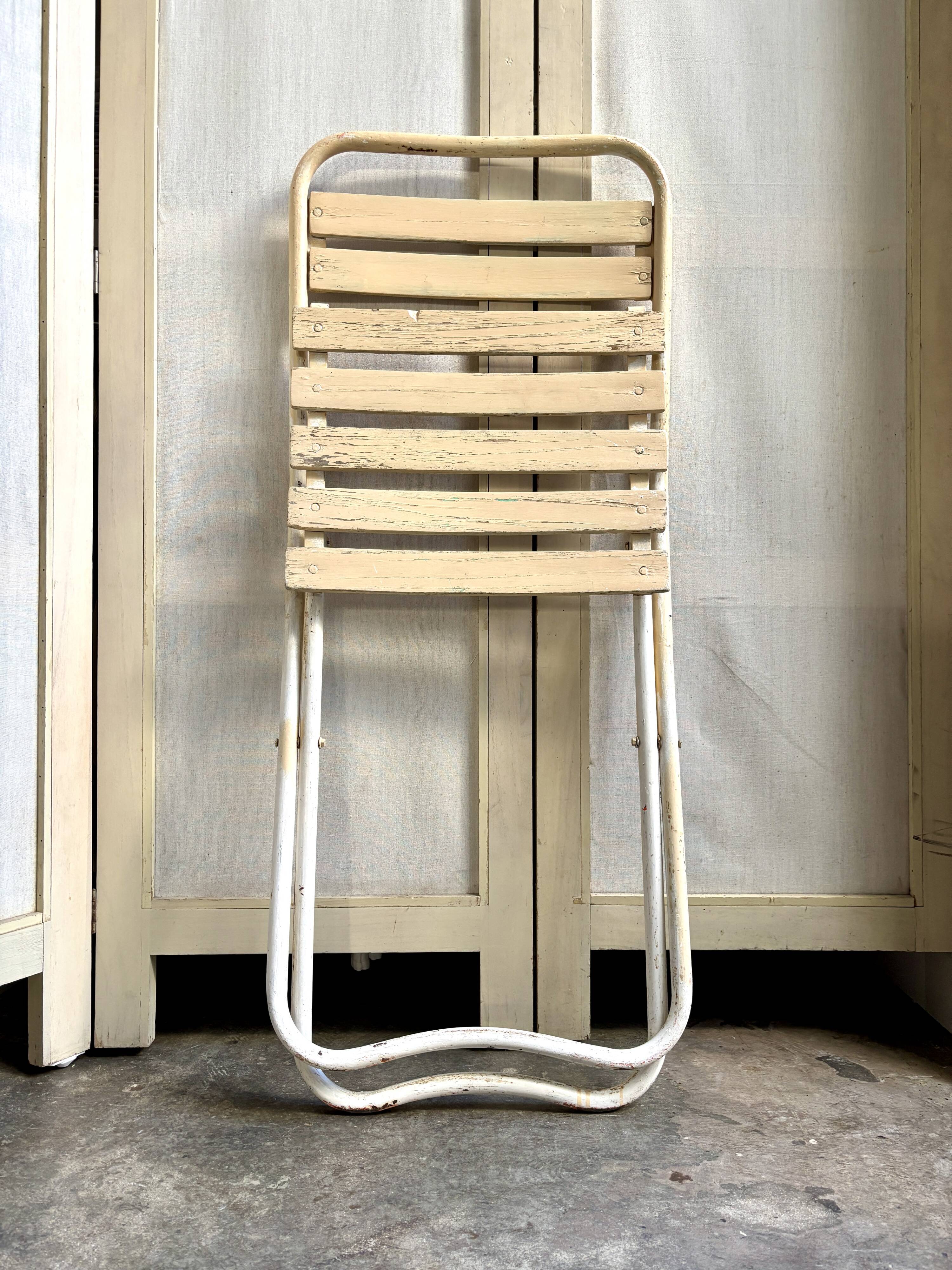 Beige wooden and metal folding chair