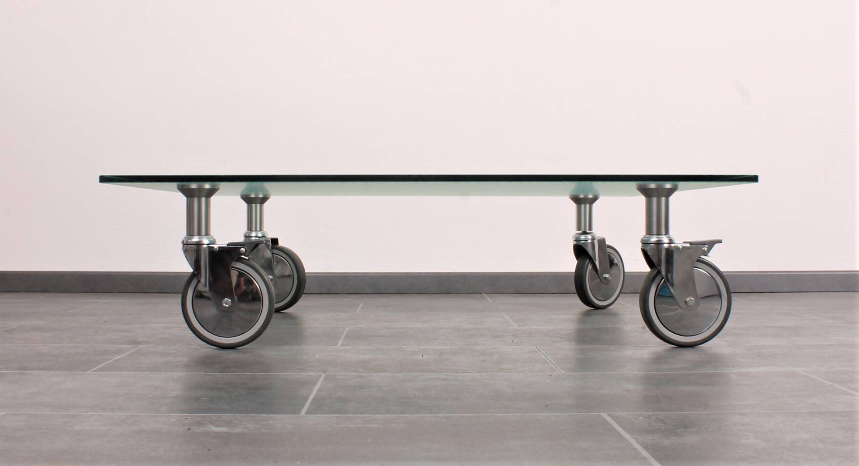 Wheeled glass coffee table