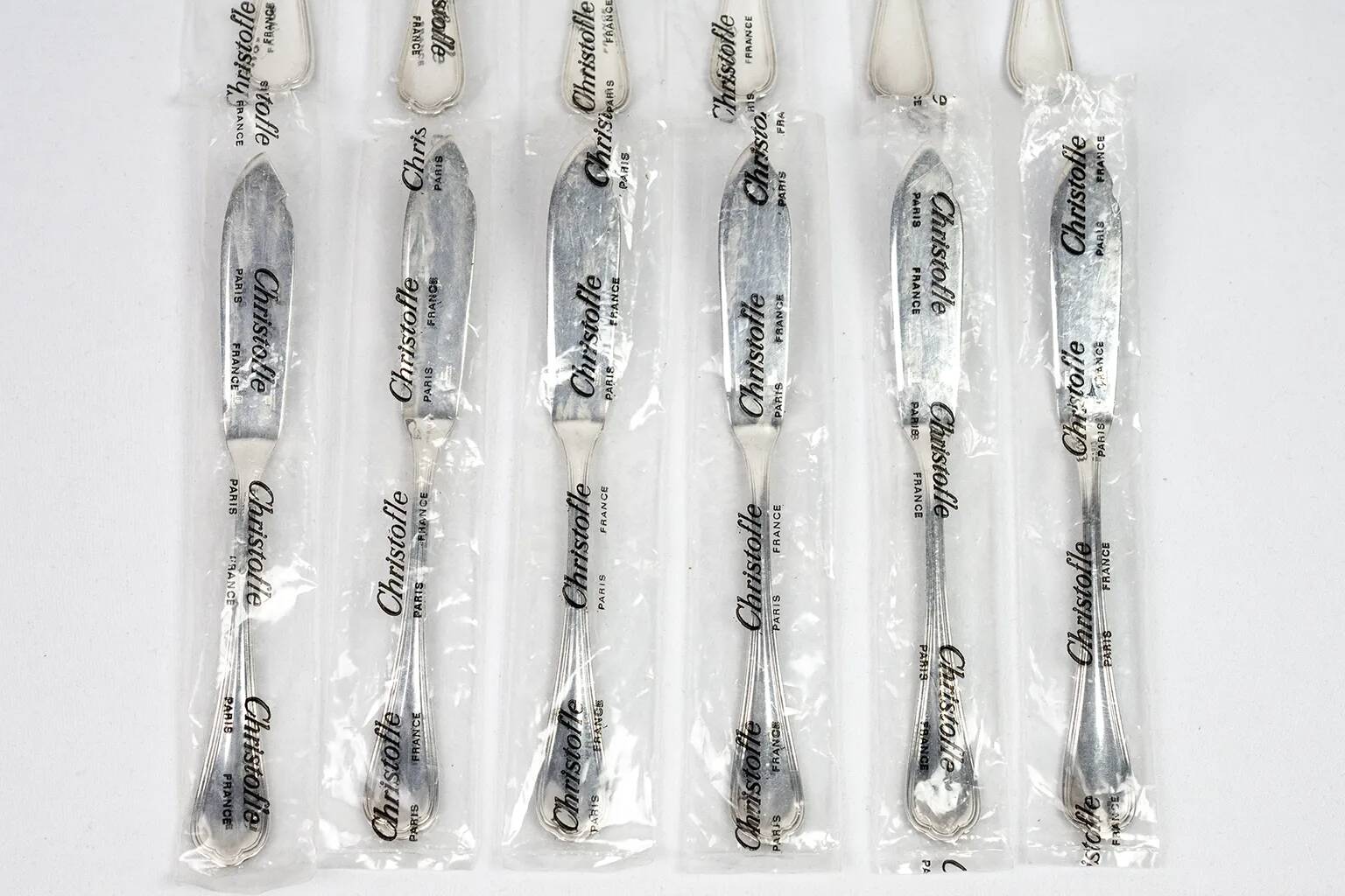Christofle – Set of 12 silver-plated fish knives, “Spatours” model