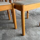 Set of 4 Scandinavian light wood dining chairs with beige polyester upholstered seats