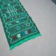 Handwoven green Moroccan hallway rug with geometric patterns.