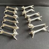 12 animal knife holders in tin