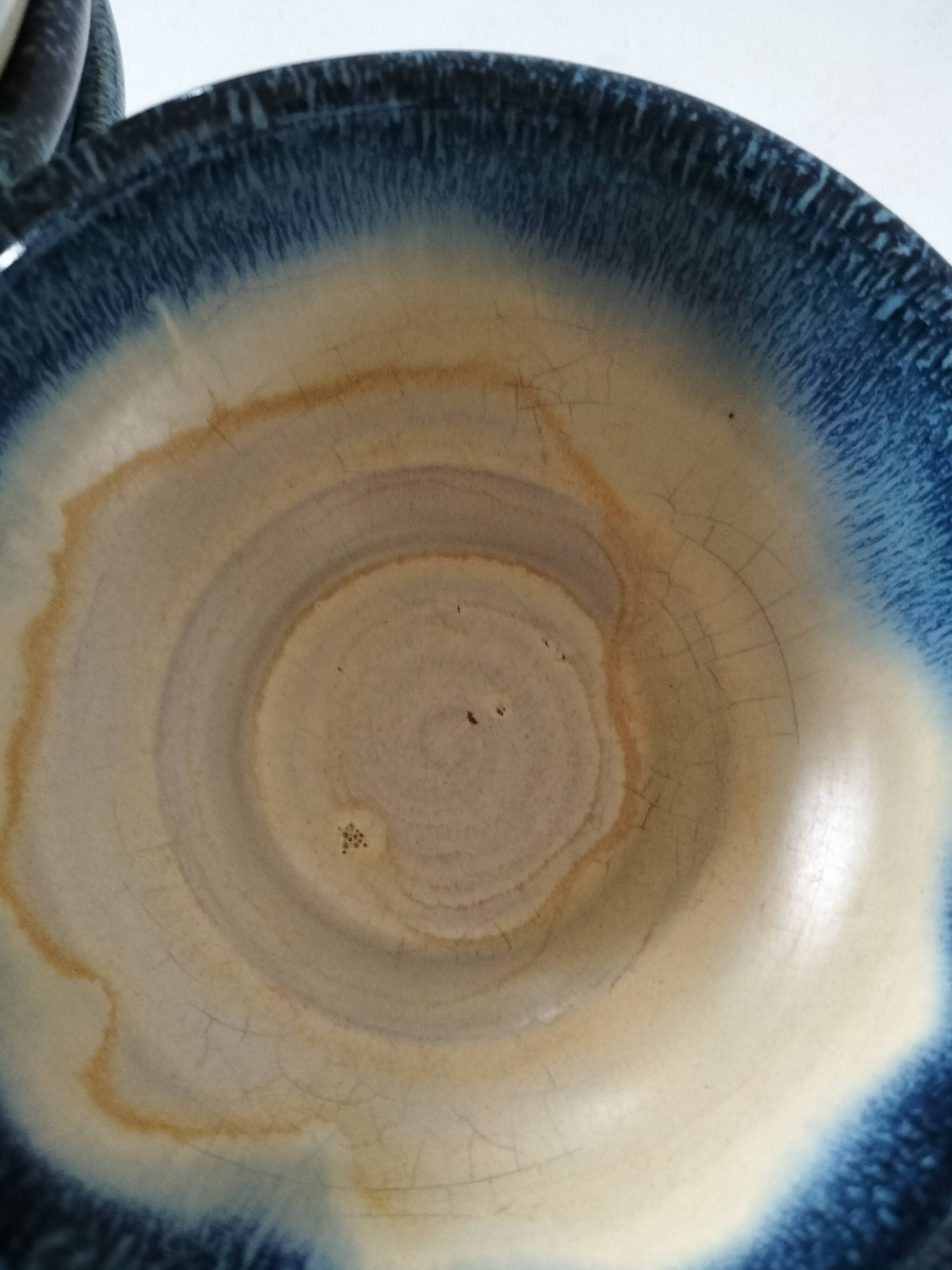 Set of 5 small blue and cream glazed stoneware bowls