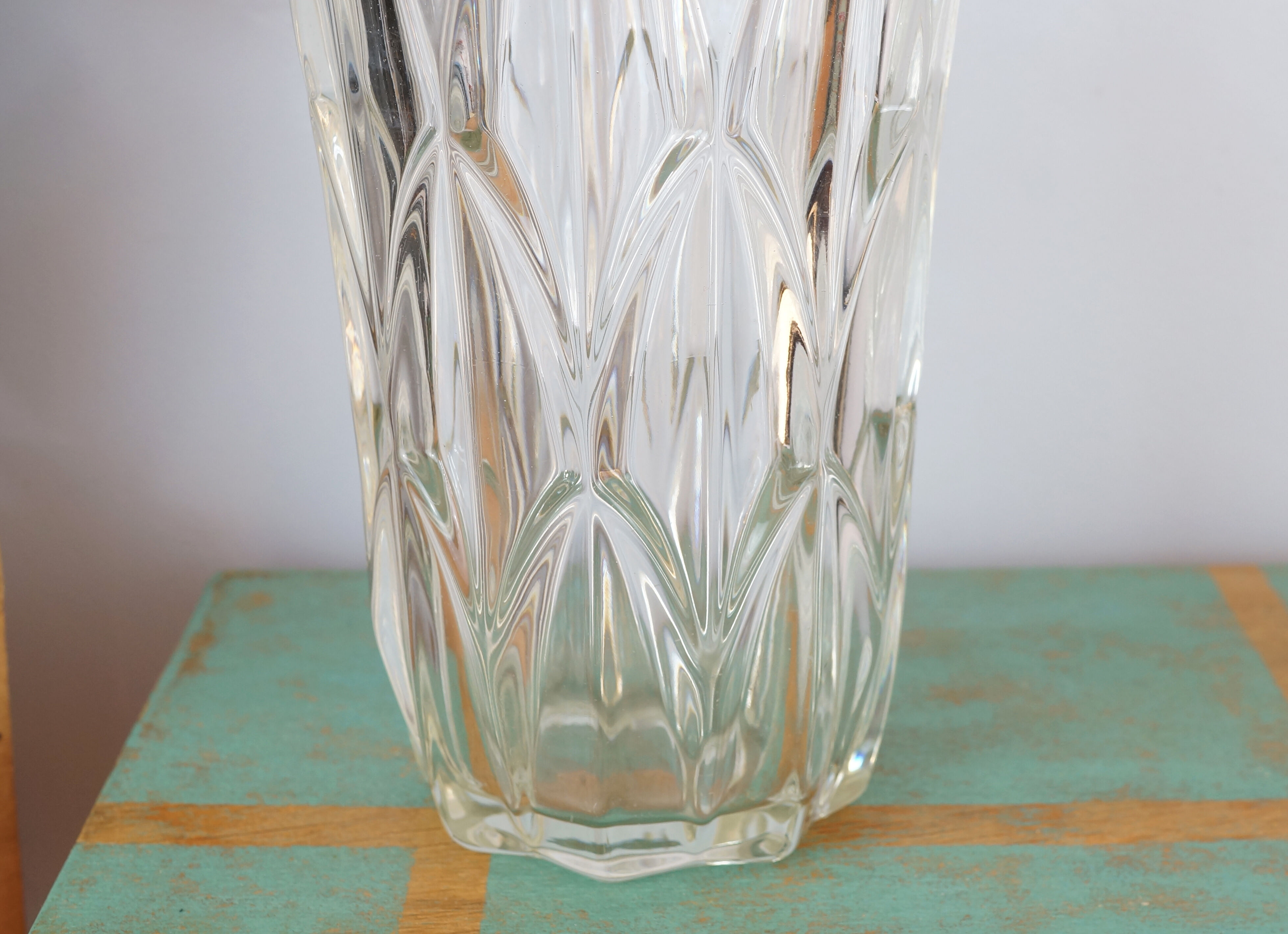 Large art deco style molded glass vase, foliage pattern
