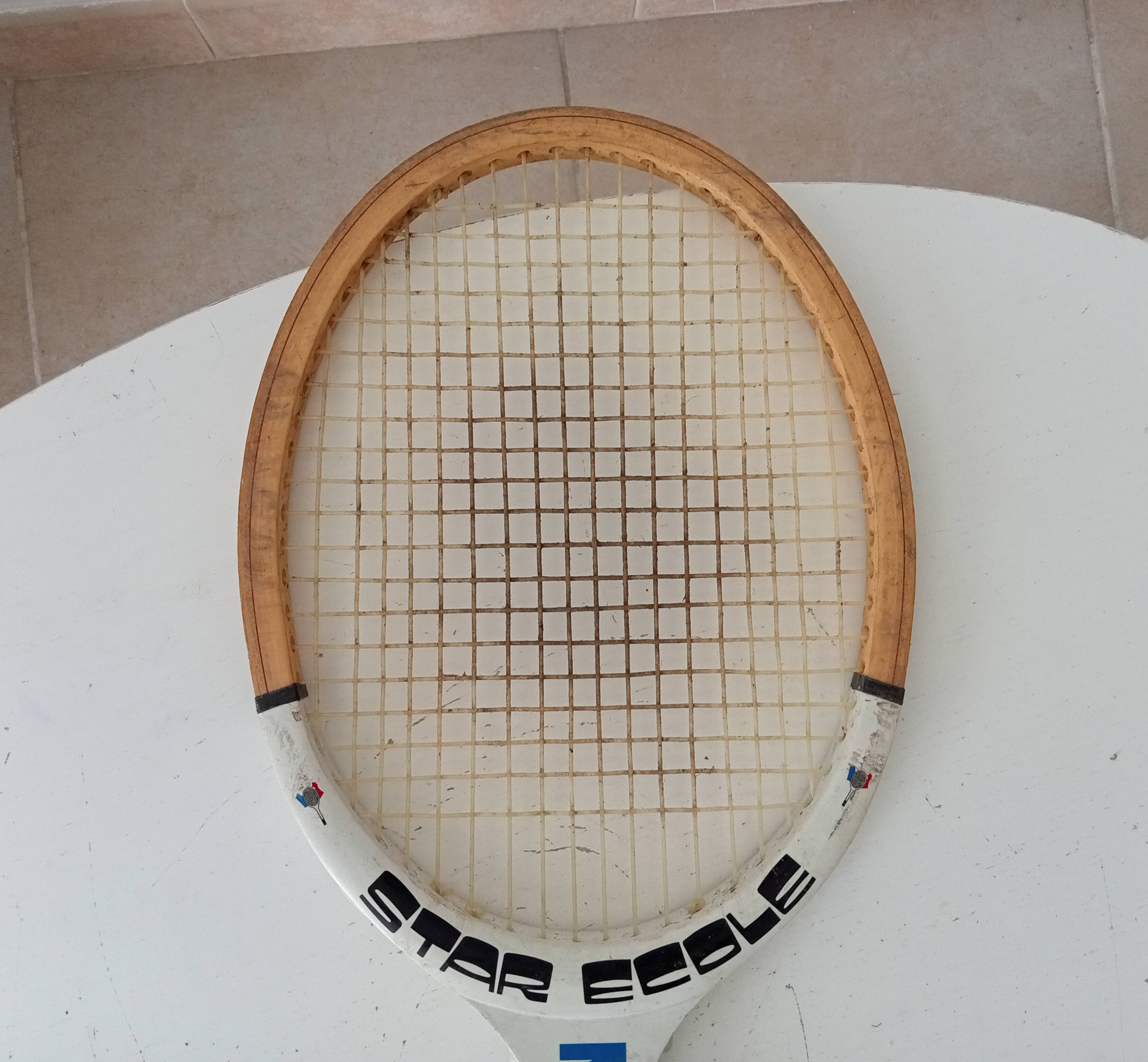 Vintage wooden tennis racket Montana