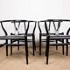 4 Danish chairs, black lacquered wood and leather, Wishbone model, Hans Wegner