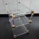 Dessert in plexiglass and brass.