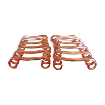 Coffret de 12 porte-couteau en métal argenté avec écrin, époque début 20 ème