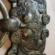 Ancient door knocker, taotié mask, shang dynasty. in bronze golden patina