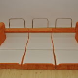 Orange corduroy modular sofa, 1970s.