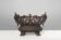 Cast Iron planter decorated with masks and lion paws, France 1850s