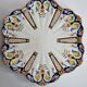 Old dish in polychrome earthenware from Desvres decorated from Rouen, signed, 34 cm