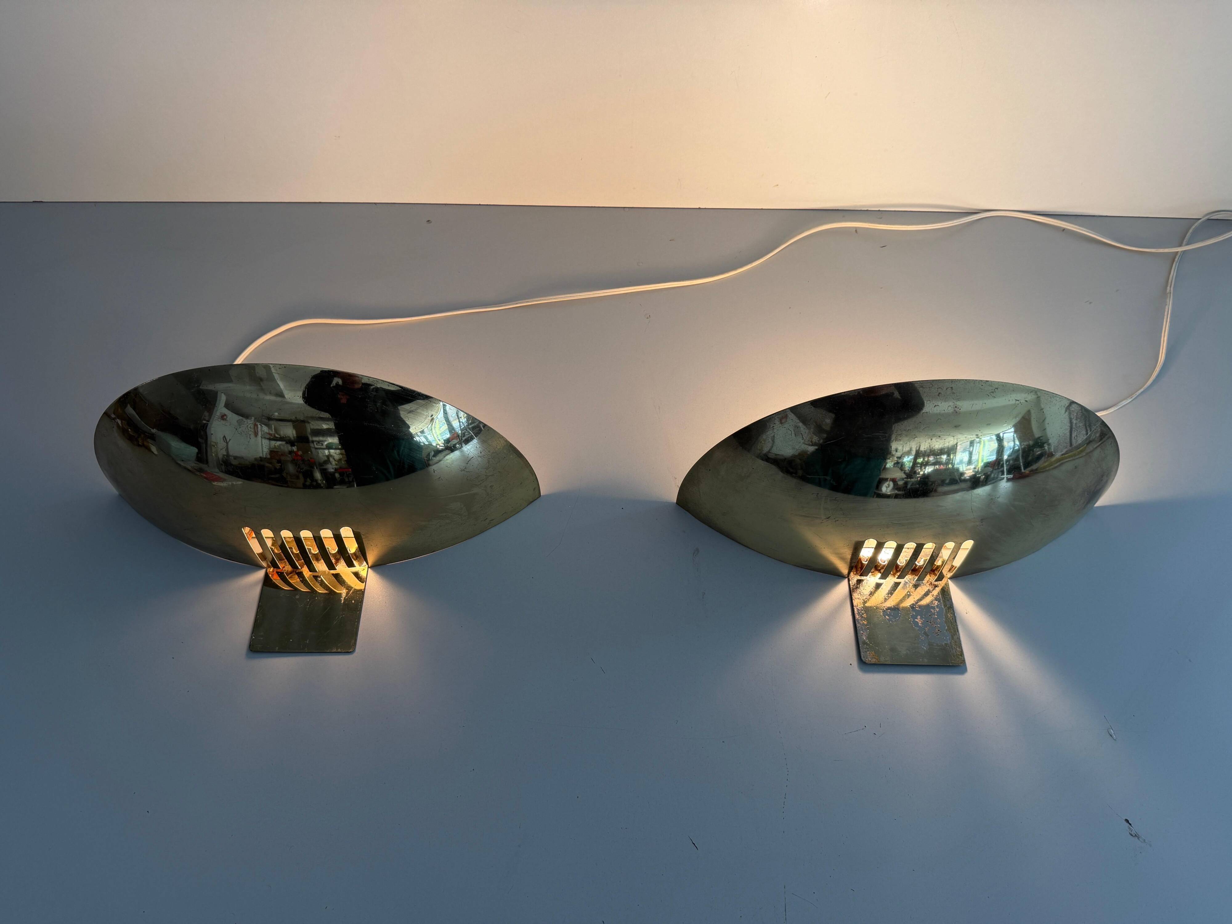 Pair of brass wall sconces from the mid-century by SCE, 1960s, France.
