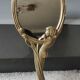 Old vanity mirror/hand face mirror/nude of a woman, naiad. art nouveau style. brass. 25 x 11 cm