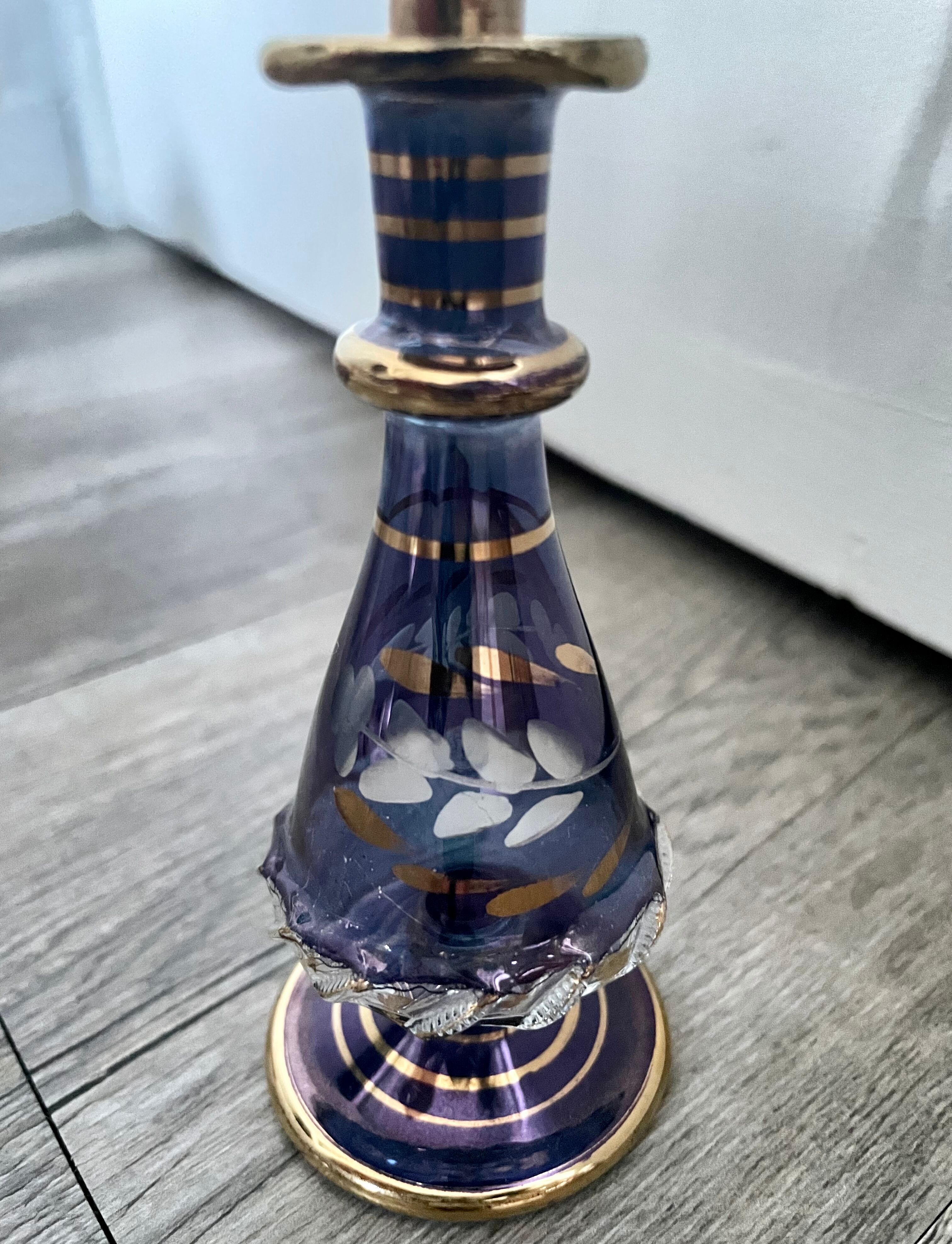 Purple glass perfume bottle