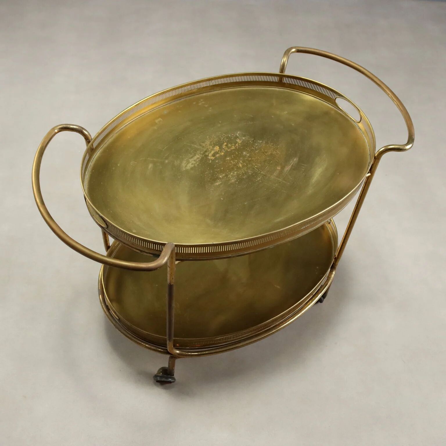 Vintage double-tier brass serving trolley, 1950s design.