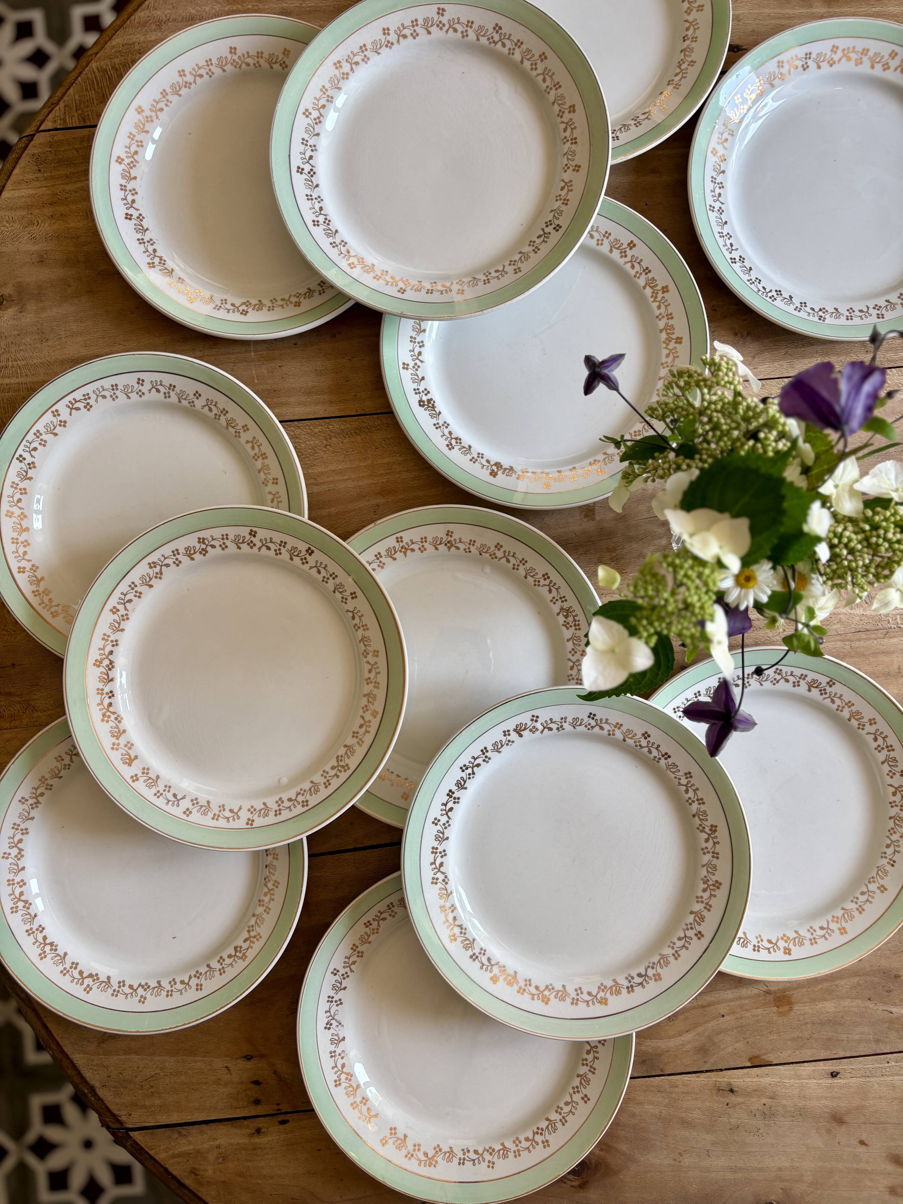 Set of 12 white, mint and gold flat plates, Mosèle de Lunéville
