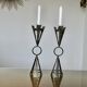 Pair of brutalist candlesticks in forged and hammered raw steel from the 1970s.