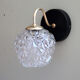 Pair of brass wall sconces and thick glass globe vintage luminaire