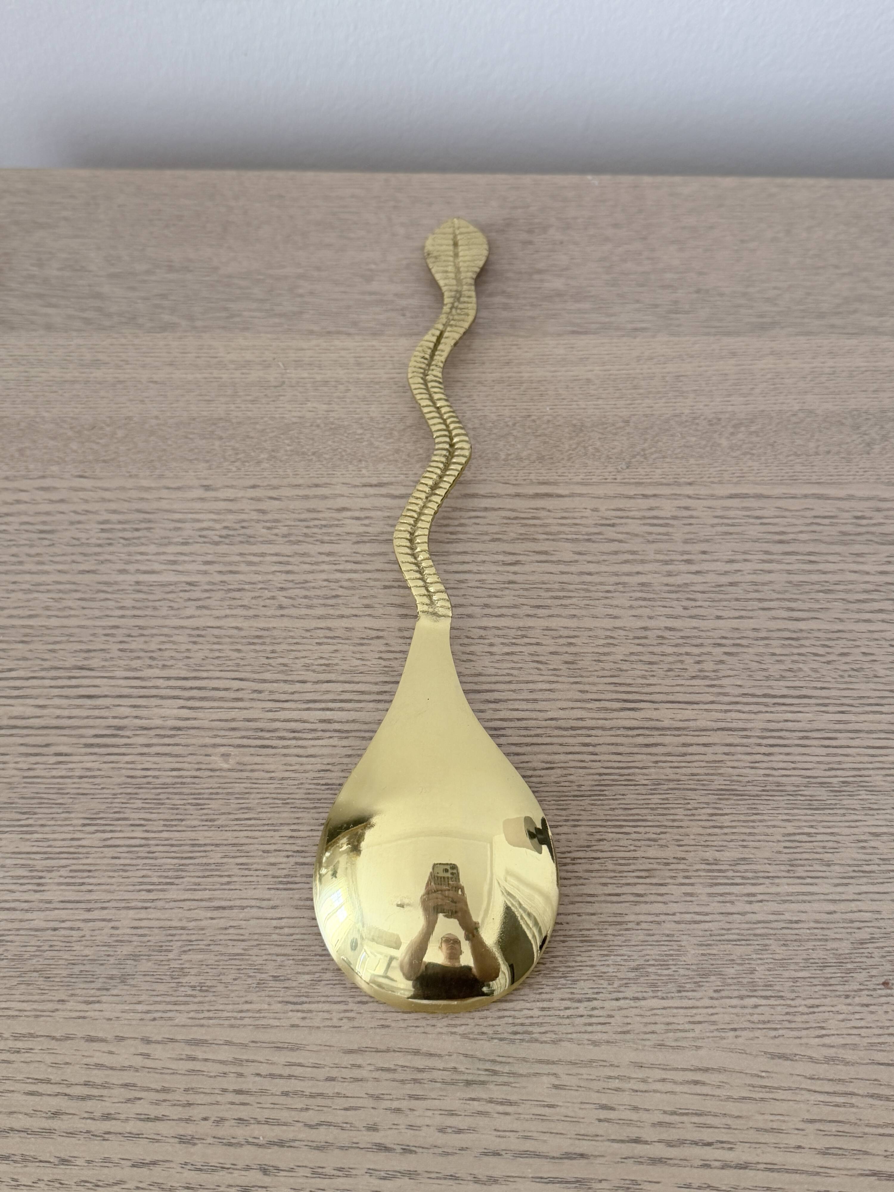 Gold metal snake salad serving set