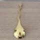 Gold metal snake salad serving set