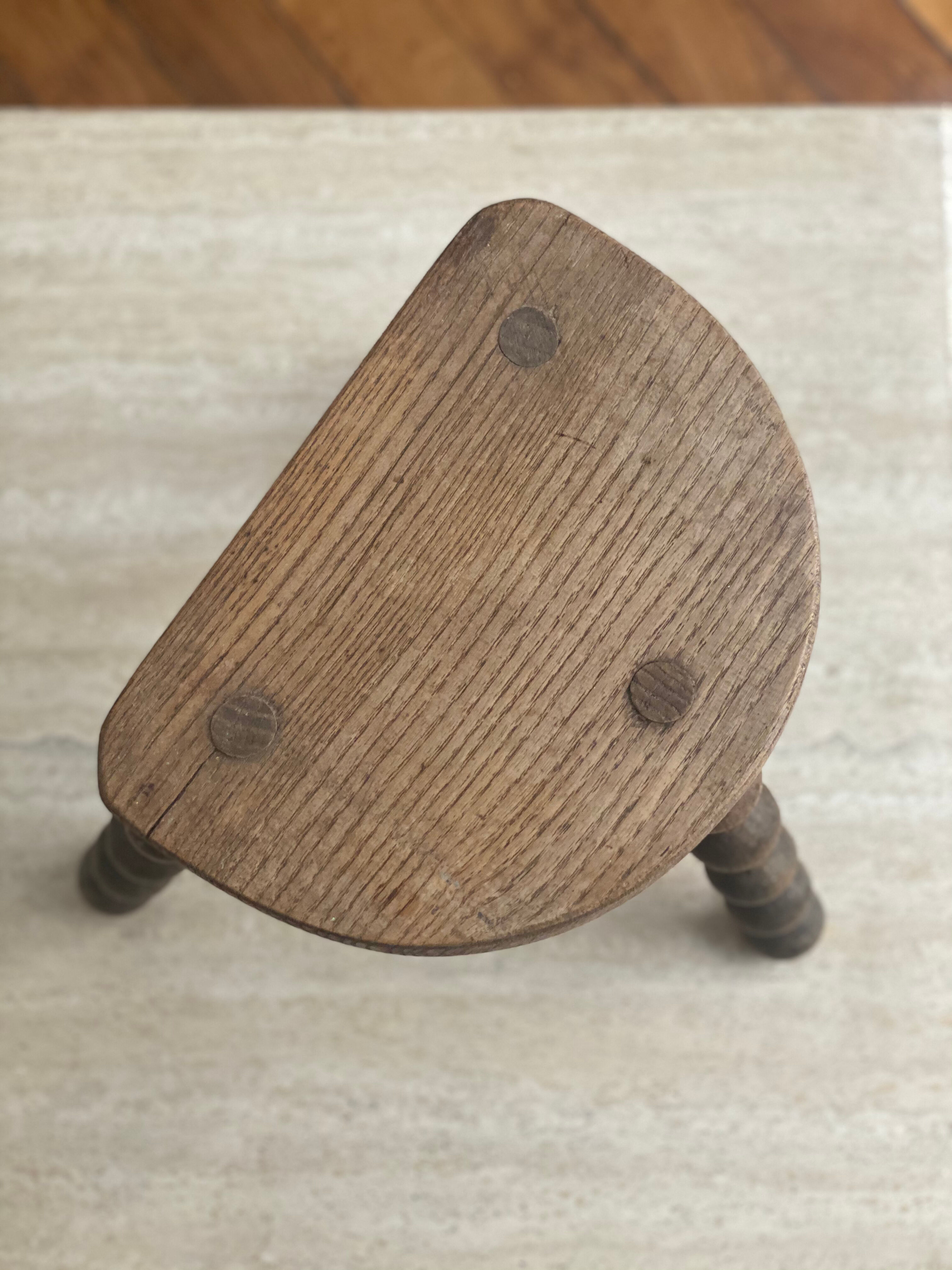 Small vintage wooden milking stool