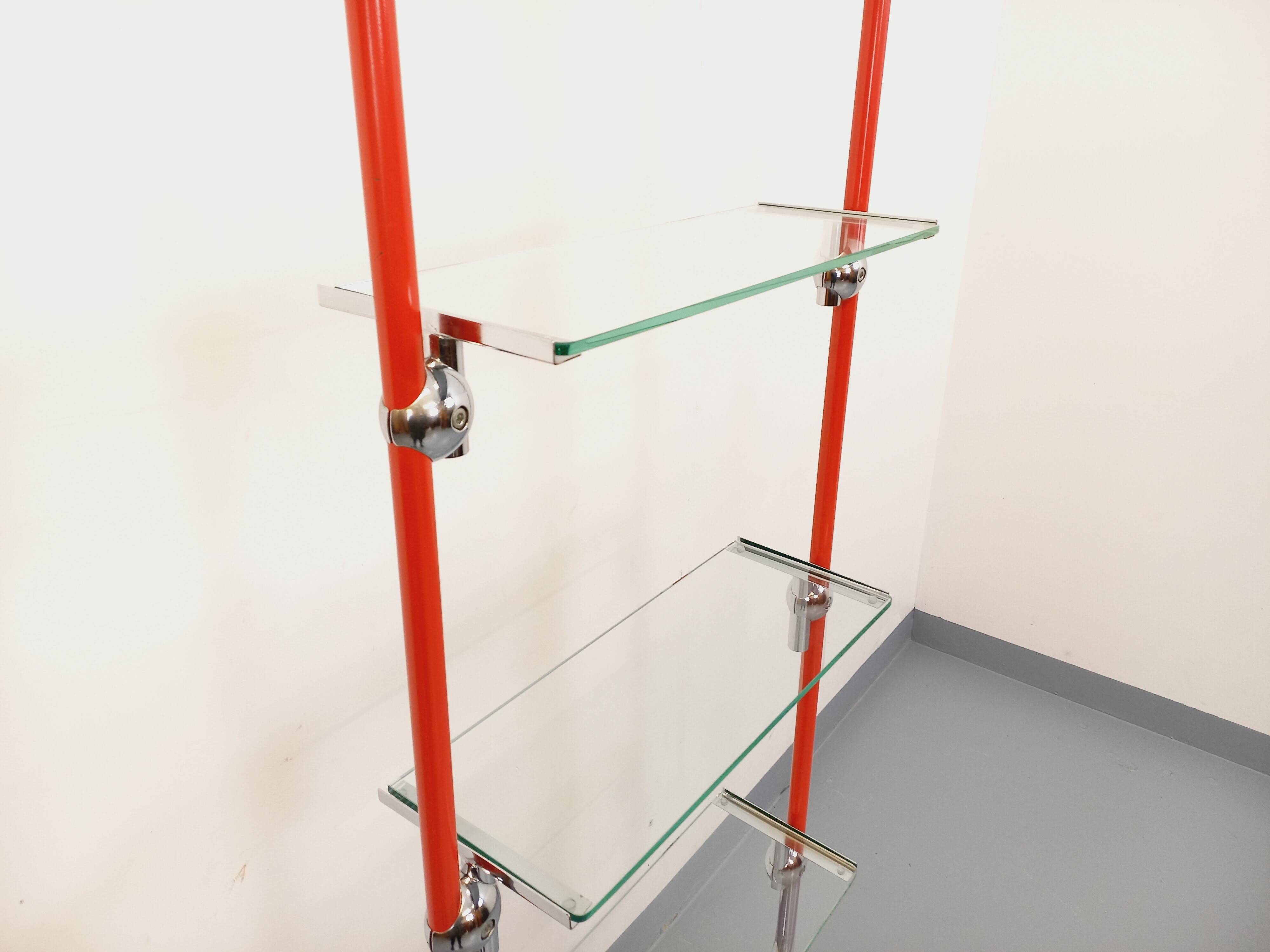 Modular bookshelf in vintage Bauhaus style, red metal, chrome.