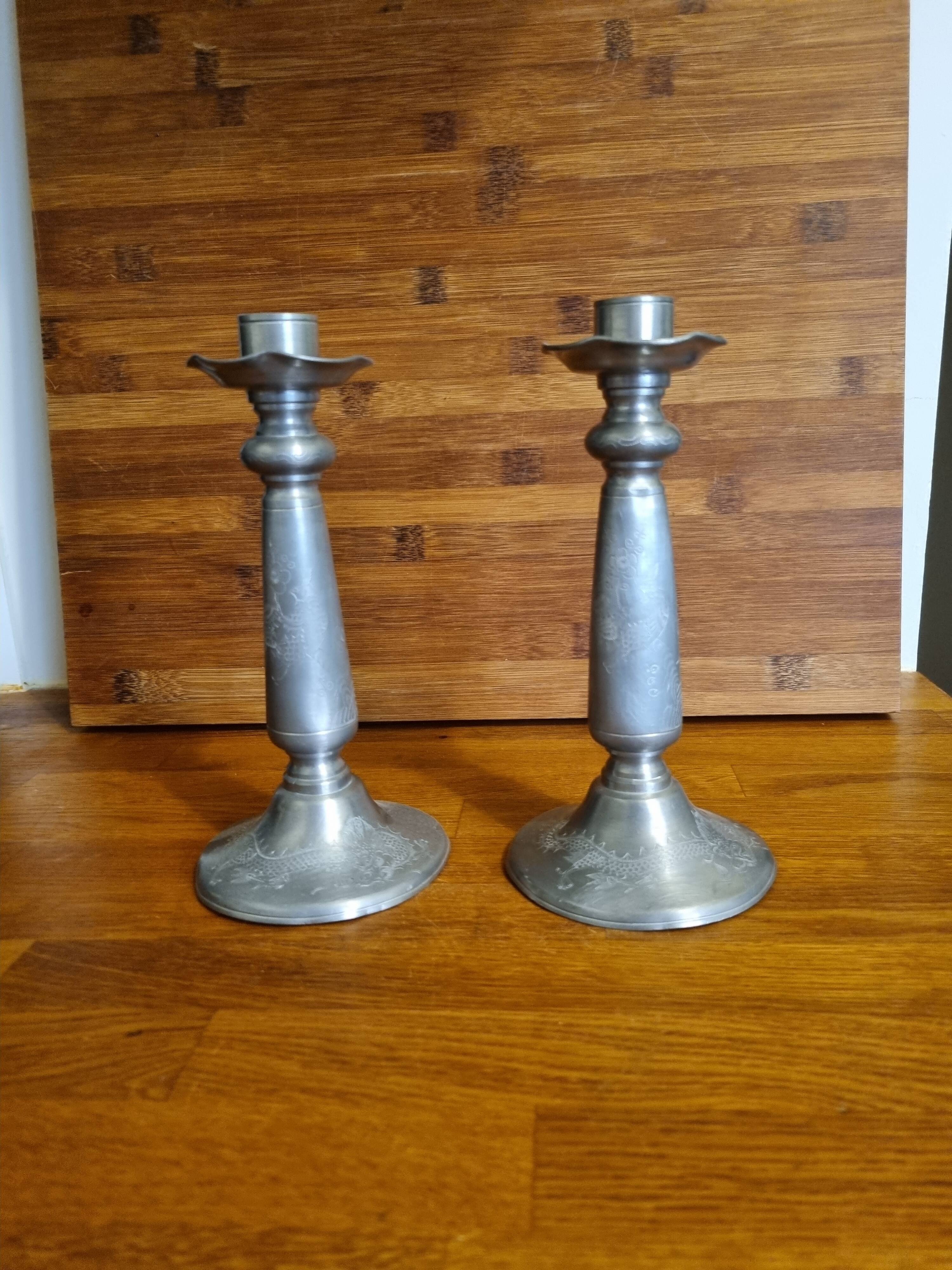Pair of old Chinese candlesticks in engraved pewter